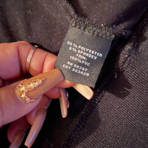 Sequin, with faux leather accents. So cute! - Picture 2 of 3